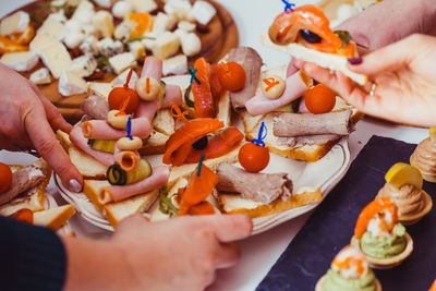 Midsection of person preparing food