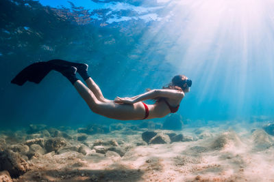 Man swimming in sea