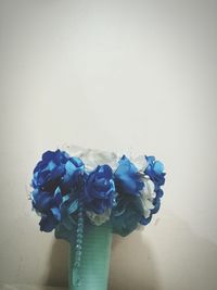 Close-up of rose bouquet against white background