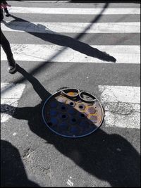 Shadow of people on road