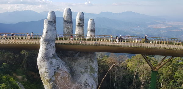 Bridge over river against sky