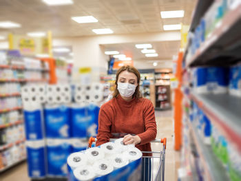 Portrait of man standing in store