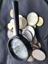 High angle view of coins on table