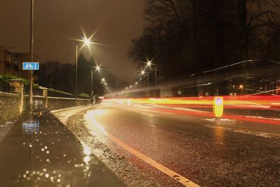 Light trails on road at night