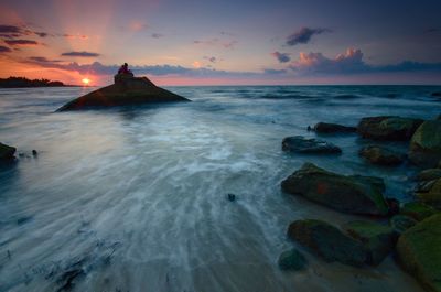 Scenic view of sea against sky during sunset