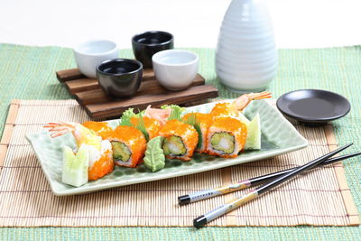 High angle view of sushi served on table