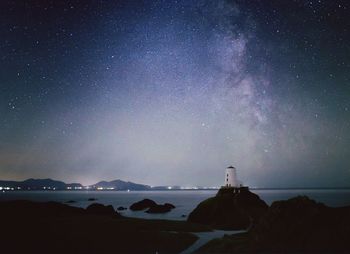 Scenic view of star field against sky at night