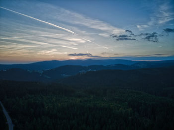 Scenic view of landscape against sky during sunset