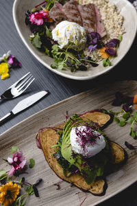 High angle view of flowers in plate on table