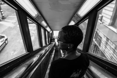 High angle view of woman on escalator