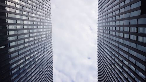 Low angle view of modern buildings against sky