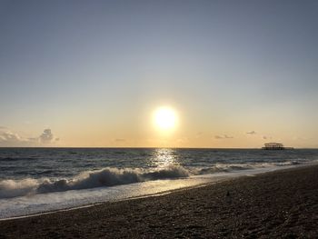 Scenic view of sea against sky during sunset