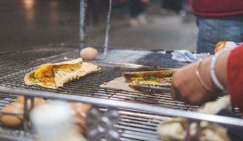 Close-up of meat on barbecue grill