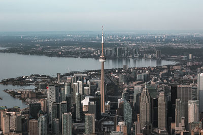 High angle view of buildings in city against sky