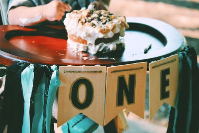 Cropped image of man eating food