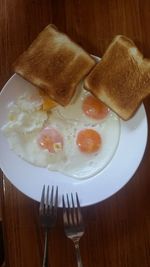 High angle view of breakfast served on table