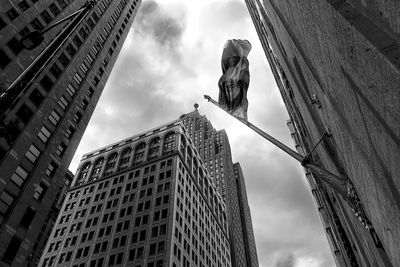 Low angle view of skyscrapers against sky