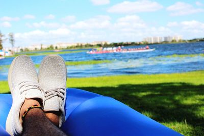 Low section of man relaxing outdoors