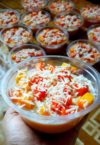 High angle view of chopped vegetables in bowl on table