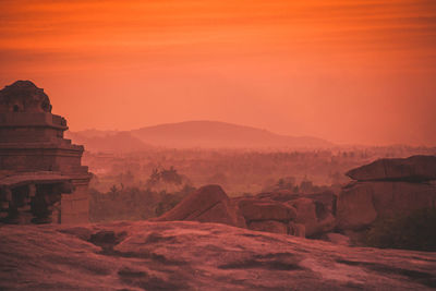 Scenic view of mountain against sky during sunset