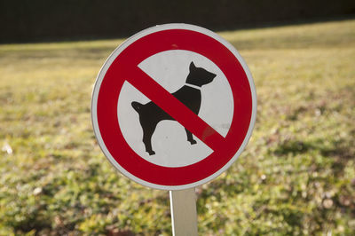 A no dogs allowed sign, ban of dogs in a specific area