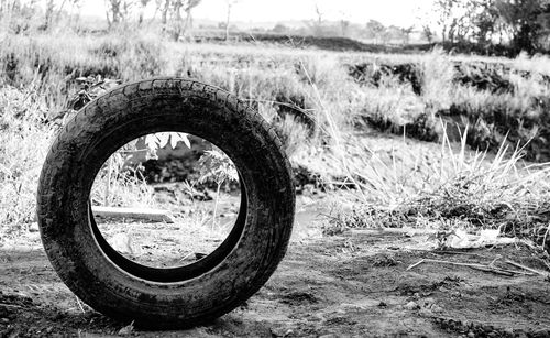 Close-up of abandoned tire track on field