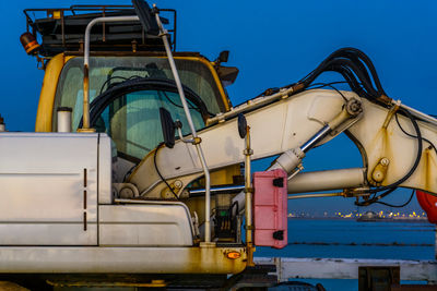 Low angle view of yellow ship against sky