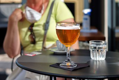 Glass of wine on table in restaurant