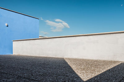 Low angle view of building against blue sky