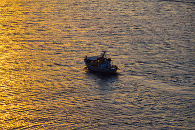 High angle view of boat sailing on sea