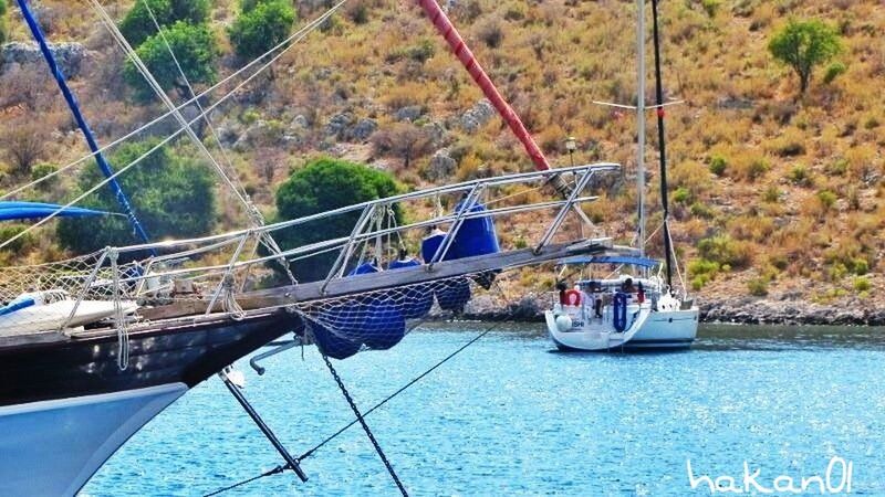 transportation, nautical vessel, mode of transport, boat, water, moored, day, river, high angle view, outdoors, no people, waterfront, built structure, connection, rope, nature, travel, harbor, architecture, sunlight