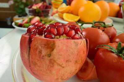 Close-up of fruits in plate on table