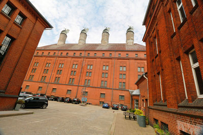 Buildings in city against sky