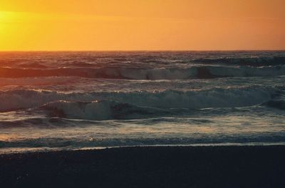 Scenic view of sea at sunset