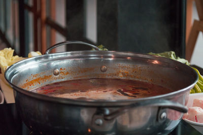 Close-up of food in container getting prepared