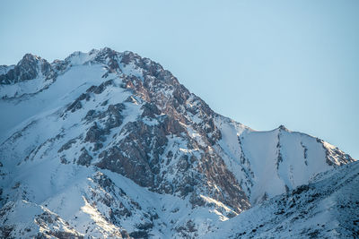 Scenic view of snowcapped mountain against sky