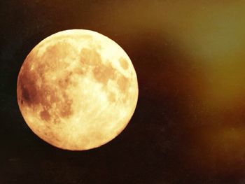 Close-up of moon over black background