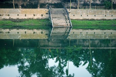 Reflection of abandoned building in water