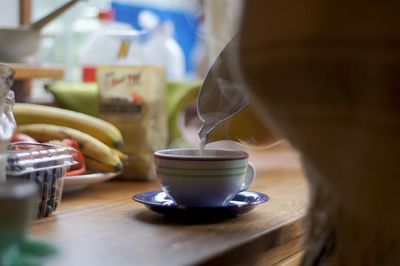 Close-up of hand holding drink