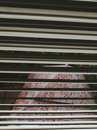 High angle view of railroad tracks by window