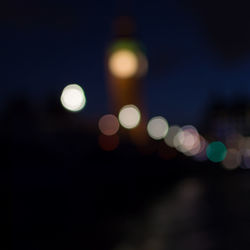 Defocused image of illuminated lights at night