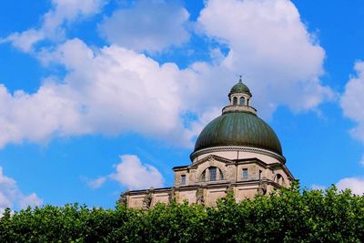 Low angle view of church against blue sky