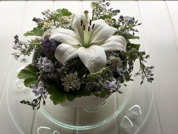 Close-up of white flower vase on table