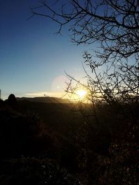 Scenic view of landscape at sunset