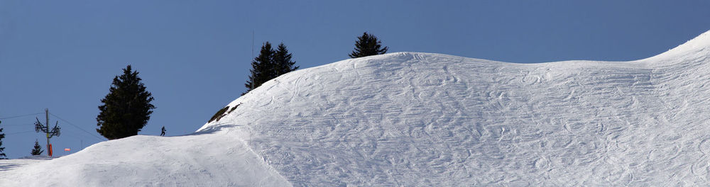 Snow covered mountain against sky