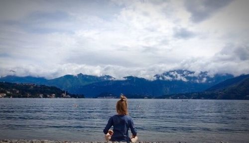 Man looking at lake