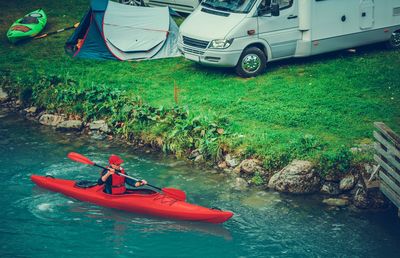 High angle view of man kayaking on river