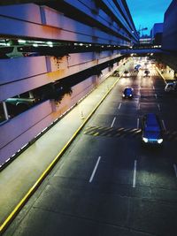 Cars on road in city at night