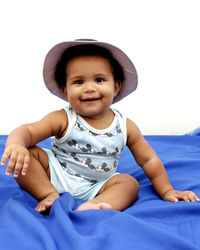 Portrait of cute baby boy over white background