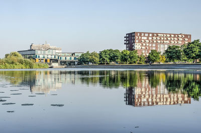 Dutch suburb reflecting under a blue sky